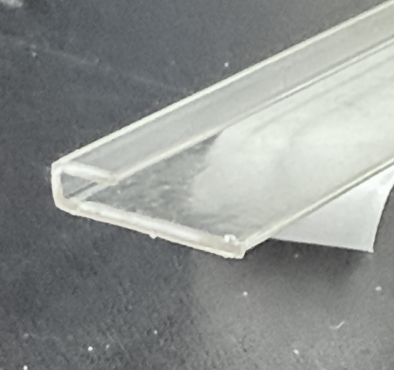 J CHANNEL 1/16" GAP ADHESIVE CLEAR 48"
